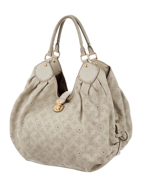 louis vuitton mahina purses